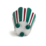 Bottom view of red and green striped tole cachepot with three rounded green feet.