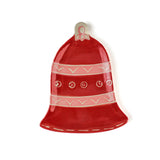 Red bell-shaped christmas dish with white patterns on a white background