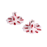 Pair of pink and white ceramic petal-shaped candle holders with hand-painted red accents, designed for decorative tabletop display.
