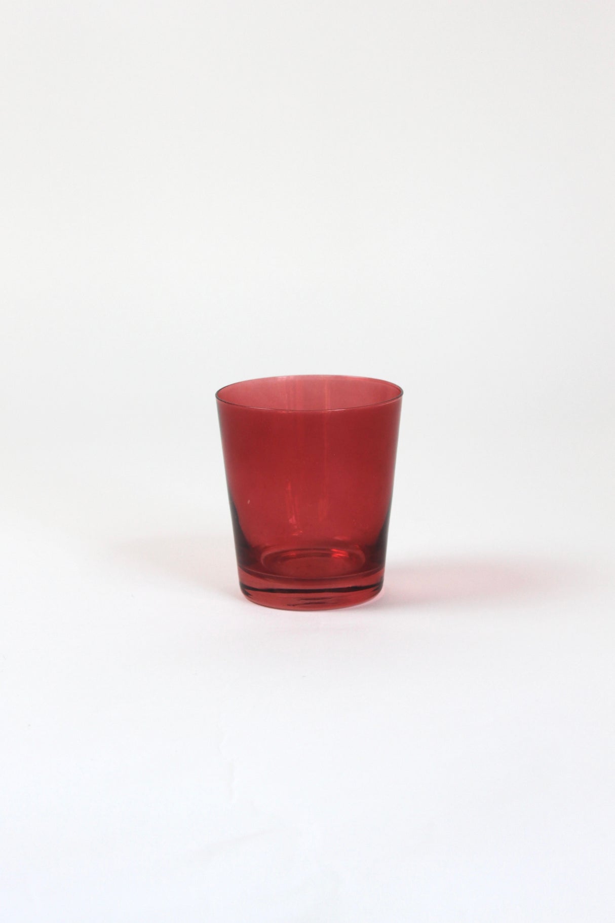 a red colored drinking glass from madcap cottage