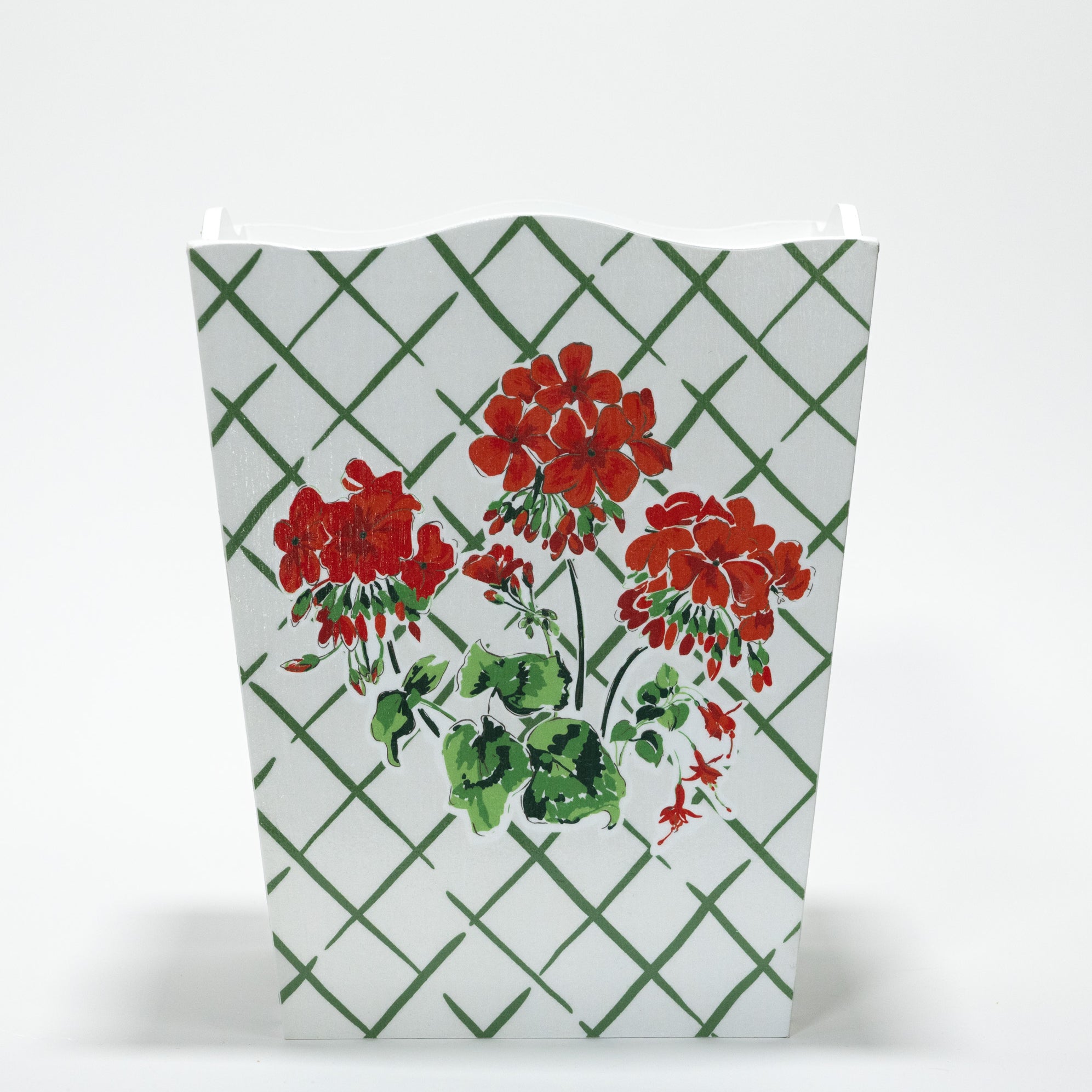 a red and white geranium wastepaper basket in "cottage Grove" pattern by madcap cottage.