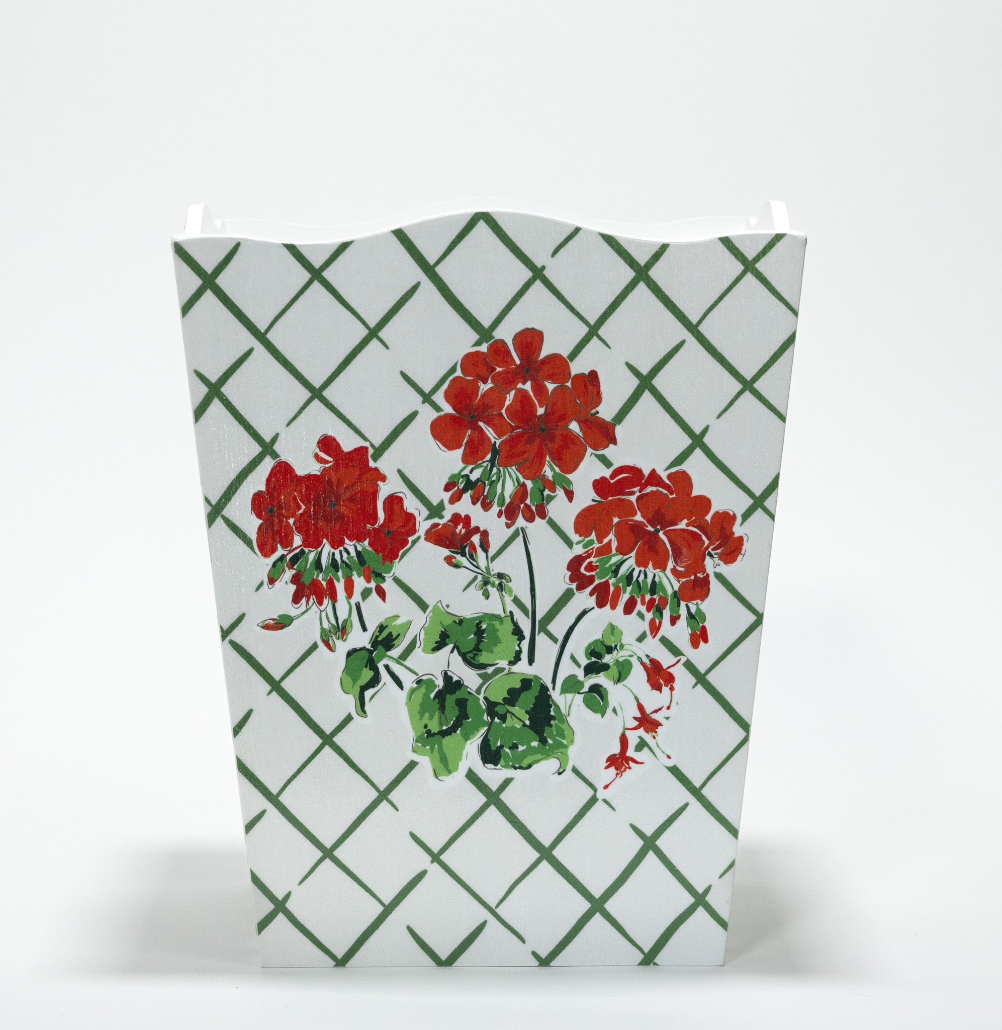 a red and white geranium wastepaper basket in "cottage Grove" pattern by madcap cottage.