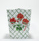 a red and white geranium wastepaper basket in "cottage Grove" pattern by madcap cottage.