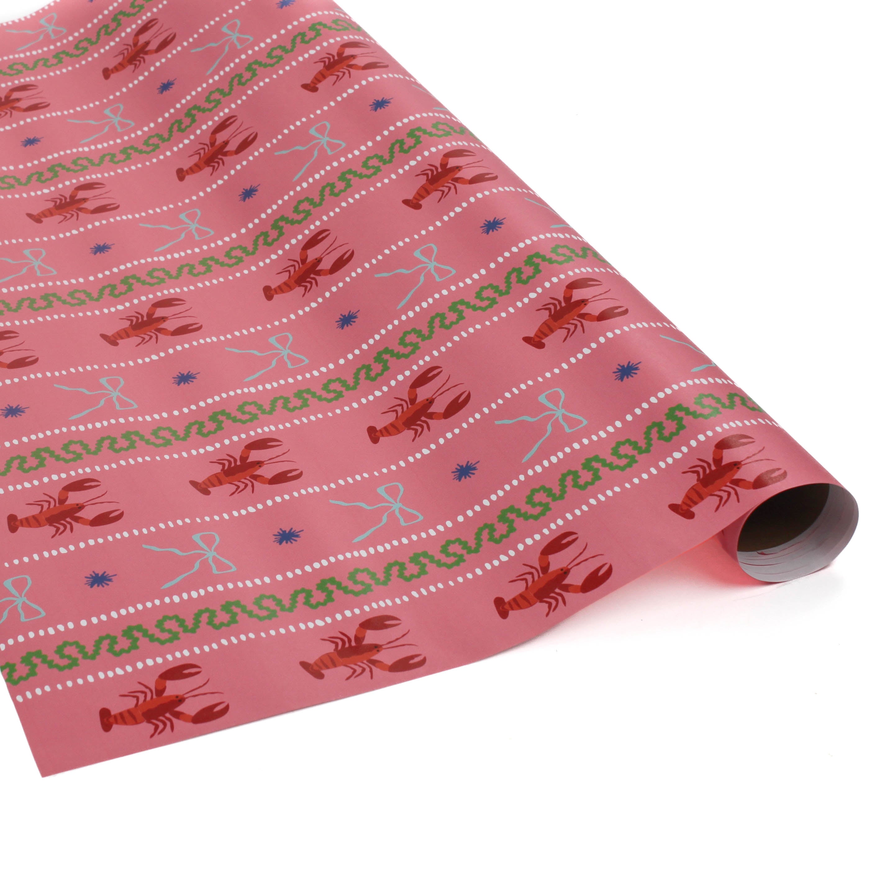 Pink wrapping paper featuring a blue ribbon and orange lobster motif