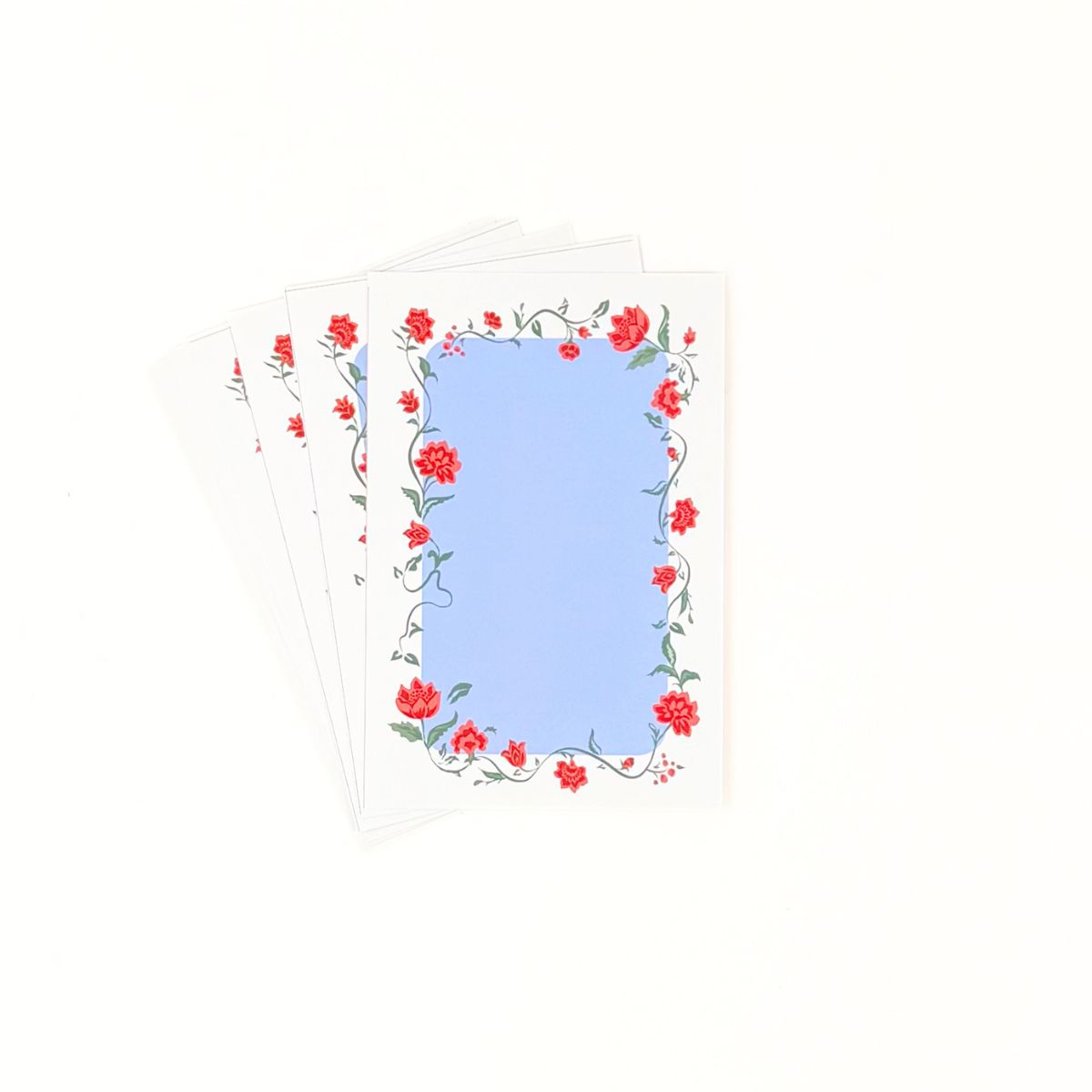 Blue menu card set with floral border design on a white background