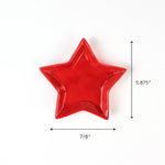 Red ceramic star-shaped dish measuring 5.875 inches tall and 7/8 inches wide, displayed on a white background.