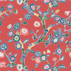 A red blue and white chinoiserie fabric sample featuring blue cherry blossom motifs on a red background. 