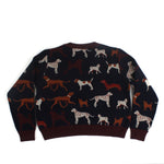 Back view of navy knit cardigan featuring an allover dog pattern