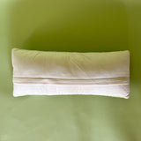 reverse view of Purple easter pillow with four easter eggs.