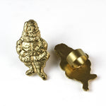 gold santa Christmas napkin rings on a white background