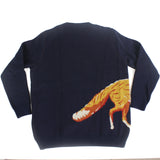Back view of navy blue knit sweater featuring a fox tail motif wrapping around the side