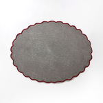 reverse of An oval Christmas rug featuring a large santa face