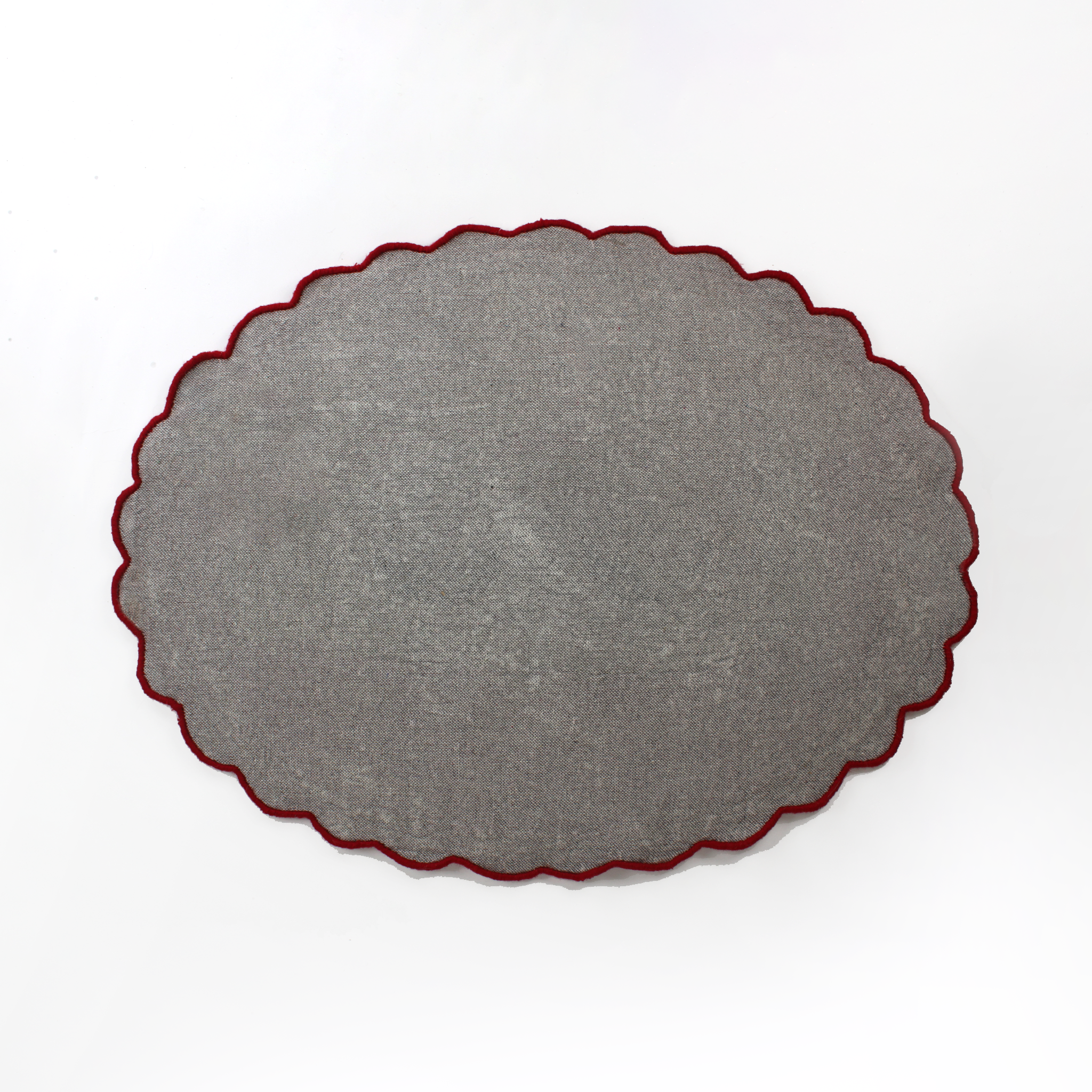 reverse of An oval Christmas rug featuring a large santa face