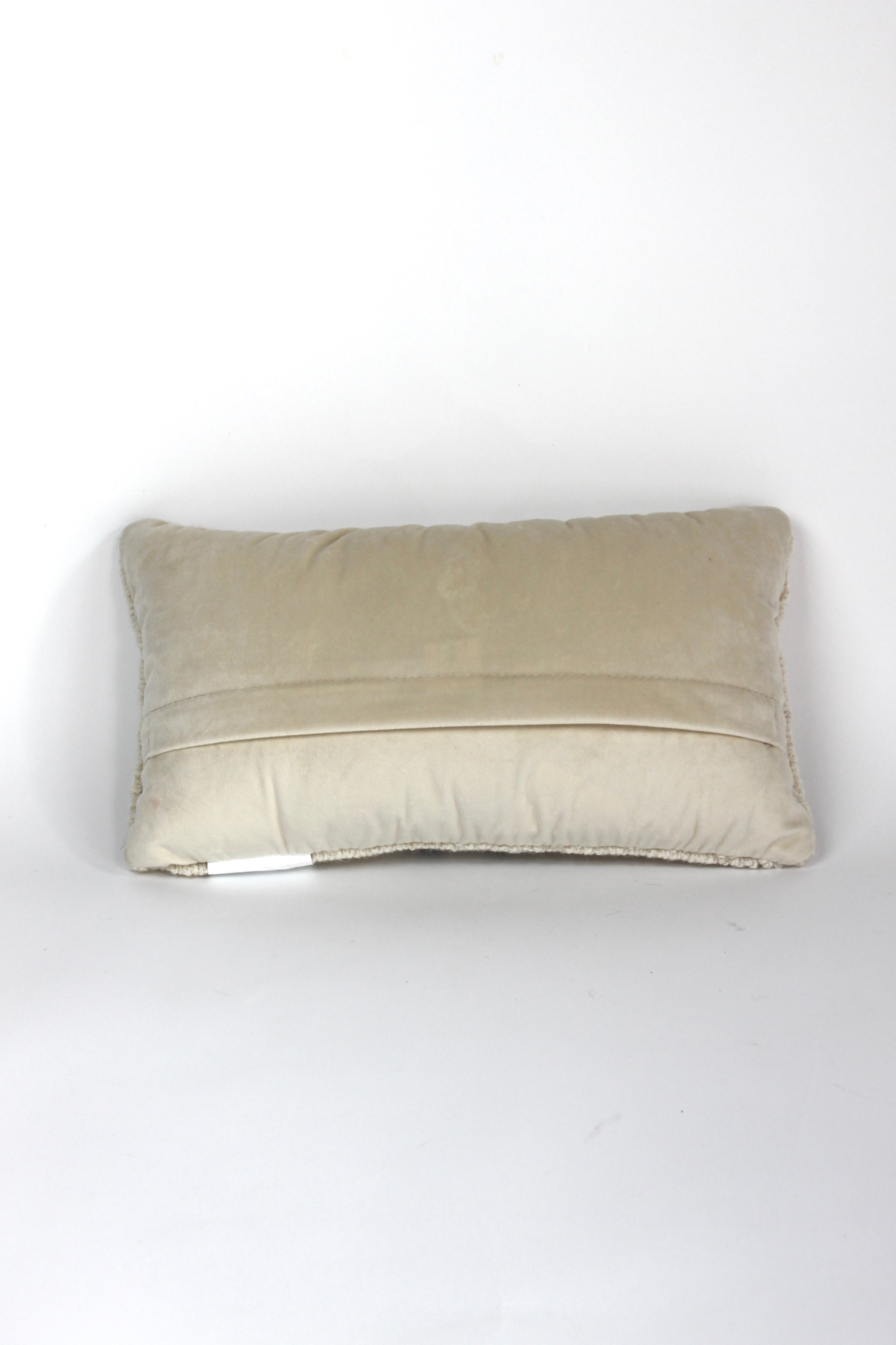 the reverse side of a white pickleball pillow with red paddles from madcap cottage