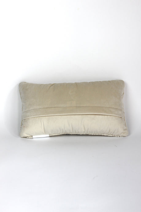 the reverse side of a white pickleball pillow with red paddles from madcap cottage