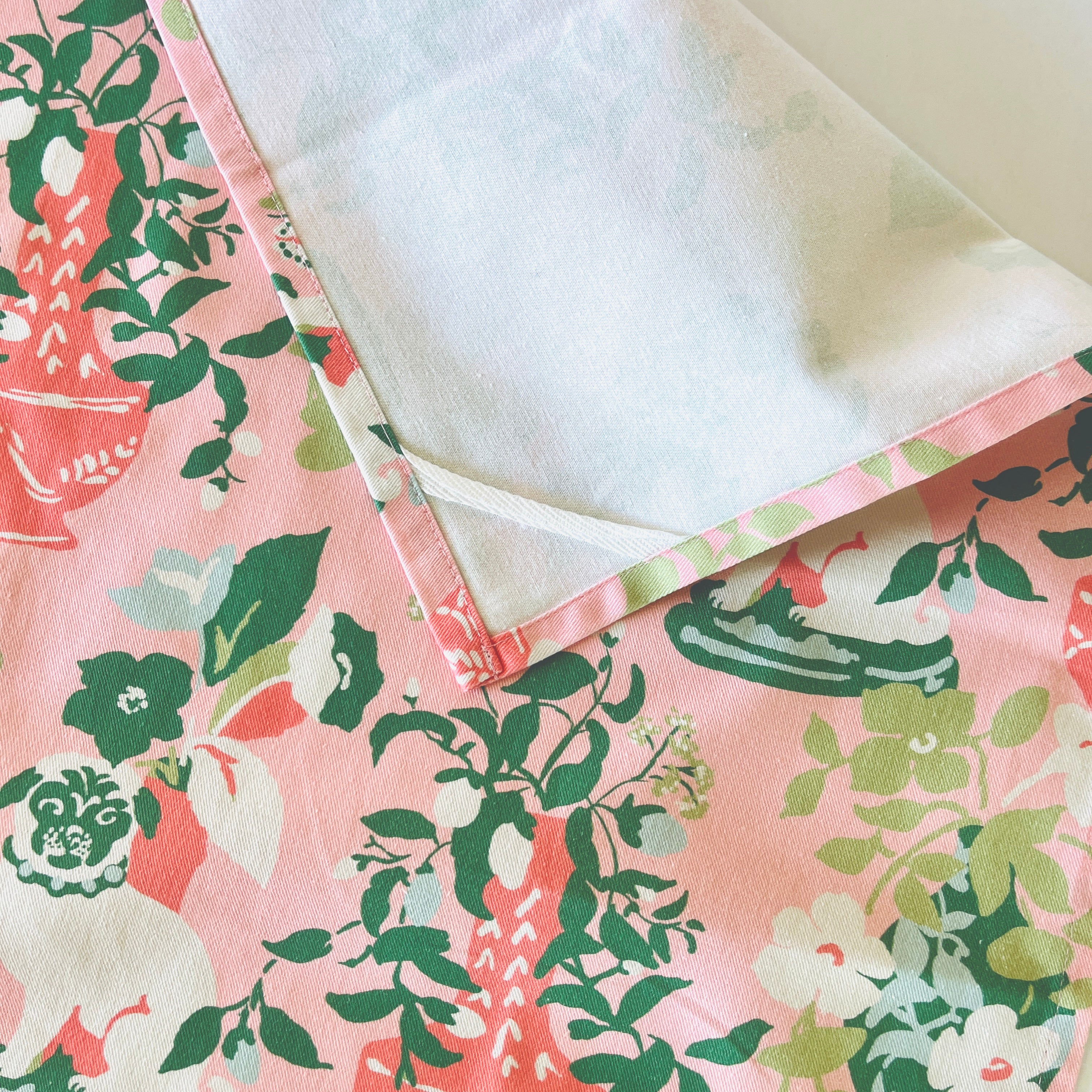 reverse corner of a pink chinoiserie tea towel from madcap cottage