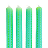 Green and blue ricrac stripe taper candles set with decorative wavy pattern for spring table decor.