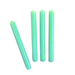 Green and blue ricrac stripe taper candles set with decorative wavy pattern for spring table decor.