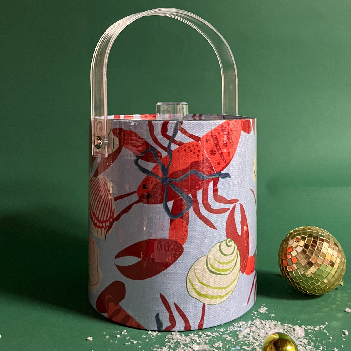 Rock Lobster Blue Bow is A blue and red lobster and shell motif patterned acrylic ice bucket