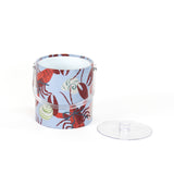Rock Lobster red and blue ice bucket filled with ice and champagne features a green shell and red lobster print