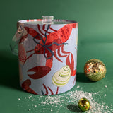 Rock Lobster is a light blue acrylic ice bucket covered in a red lobster and shell pattern.