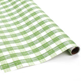 Green gingham Christmas wrapping paper roll with hand-drawn plaid pattern.