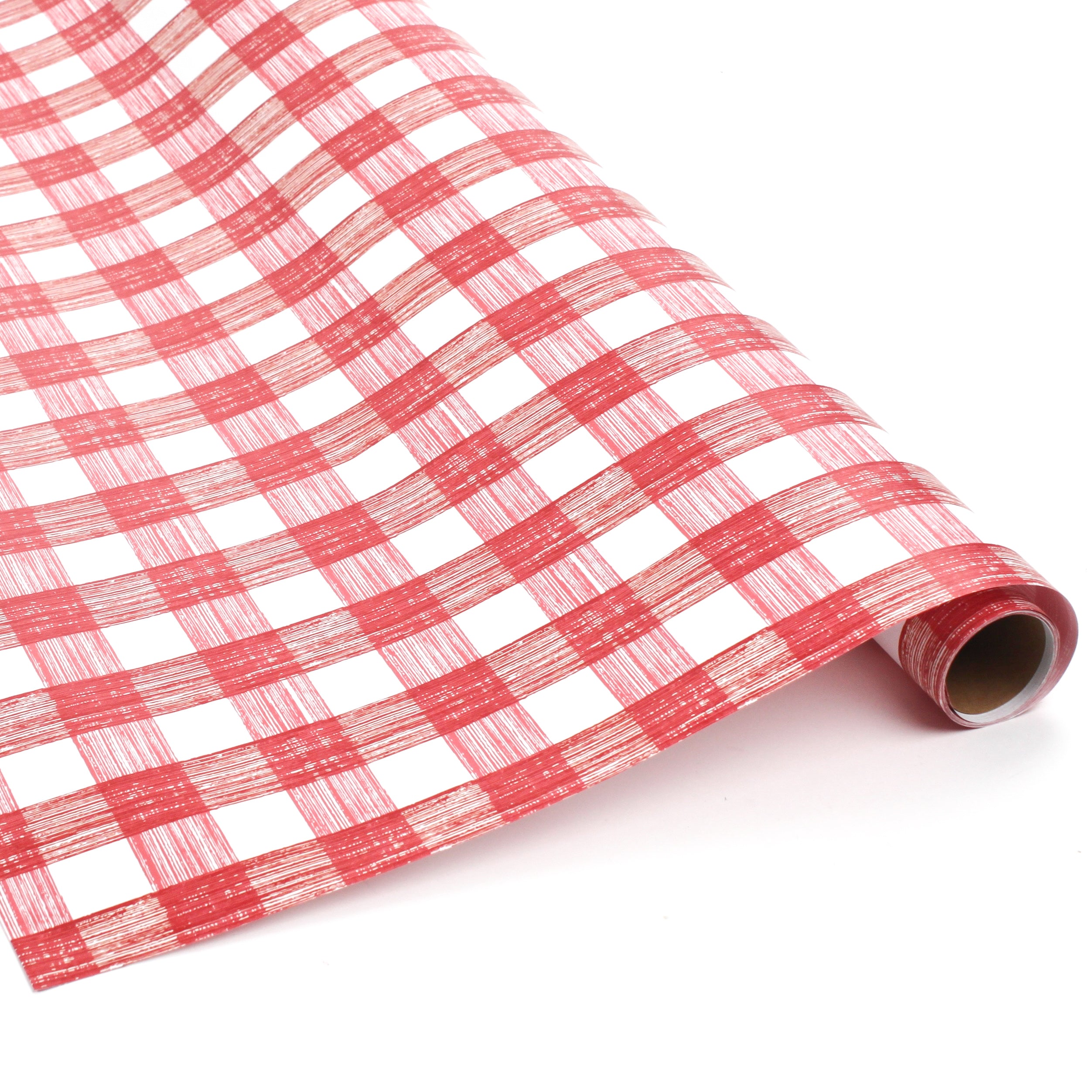 Roll of red and white gingham patterned holiday wrapping paper.