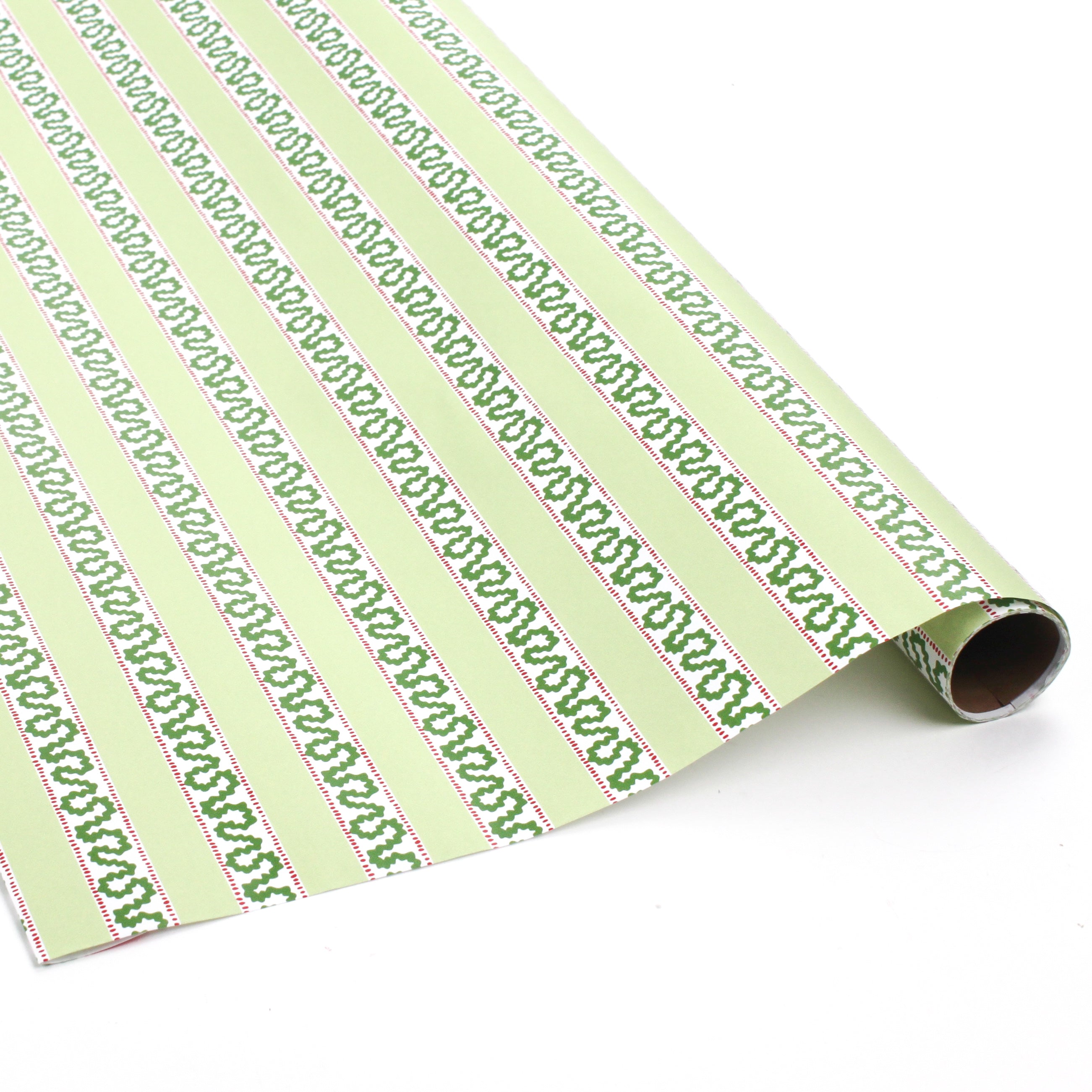 Light green Christmas wrapping paper roll with red and green holly-inspired stripe pattern, partially unrolled on a white surface.