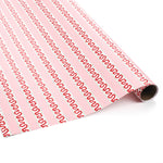 a roll of red and pink striped wrapping paper in fancy stripe patterns
