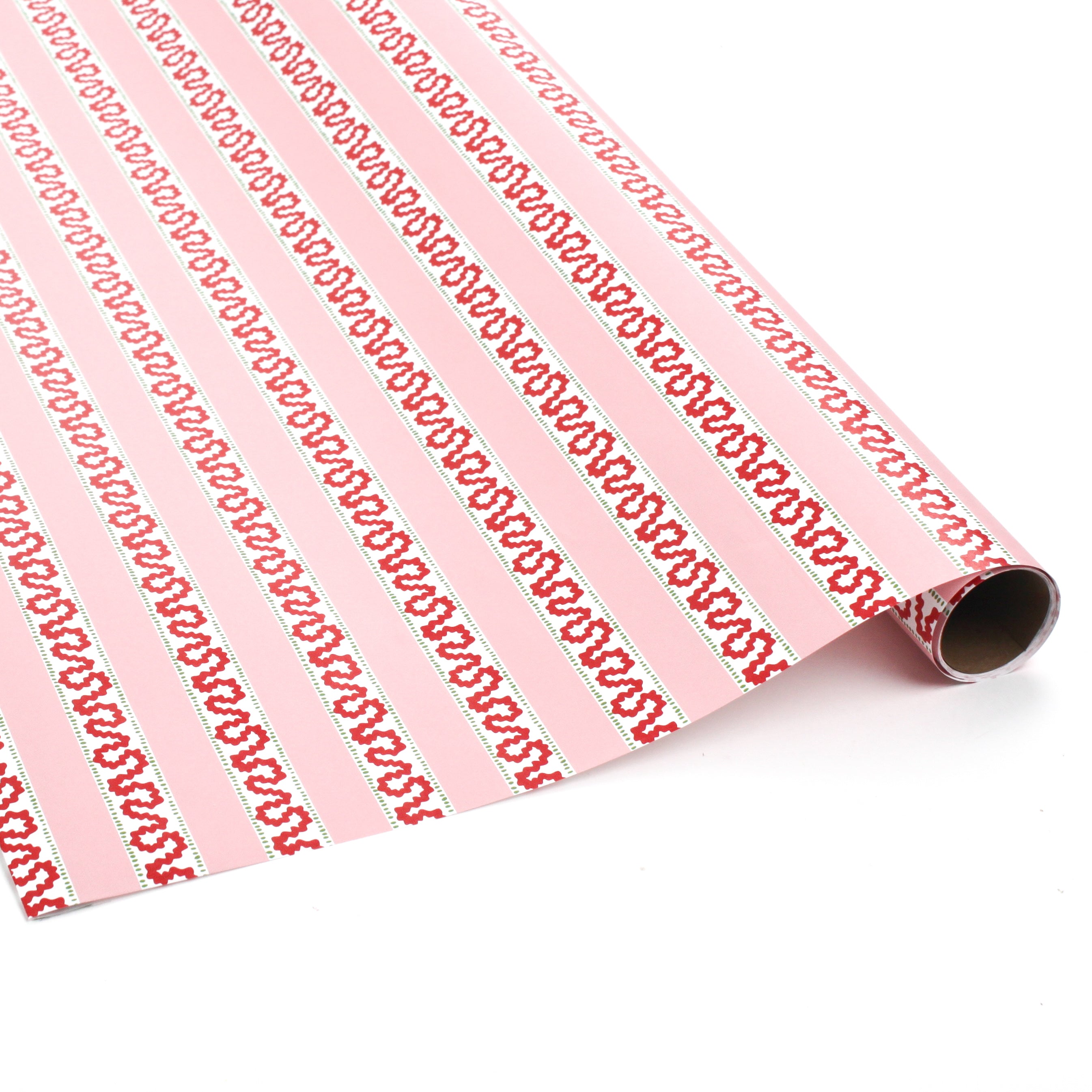 a roll of red and pink striped wrapping paper in fancy stripe patterns