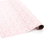 Red and white geometric patterned wrapping paper roll displayed on a white background.