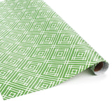Rolls of wrapping paper with a geometric lattice pattern in green