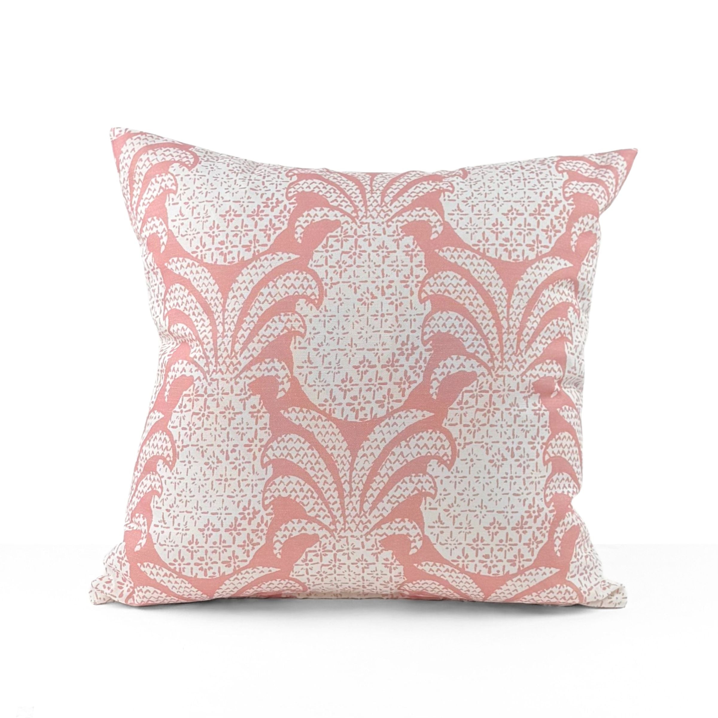 Pink outdoor pillow with pineapple motif and tropical charm.