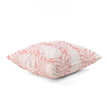 Pink outdoor pillow with elegant pineapple-inspired tropical pattern.