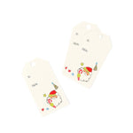 Two cream-colored gift tags with hanging holes, one printed with a cute cartoon Santa Claus and the other blank, shown on a white background.