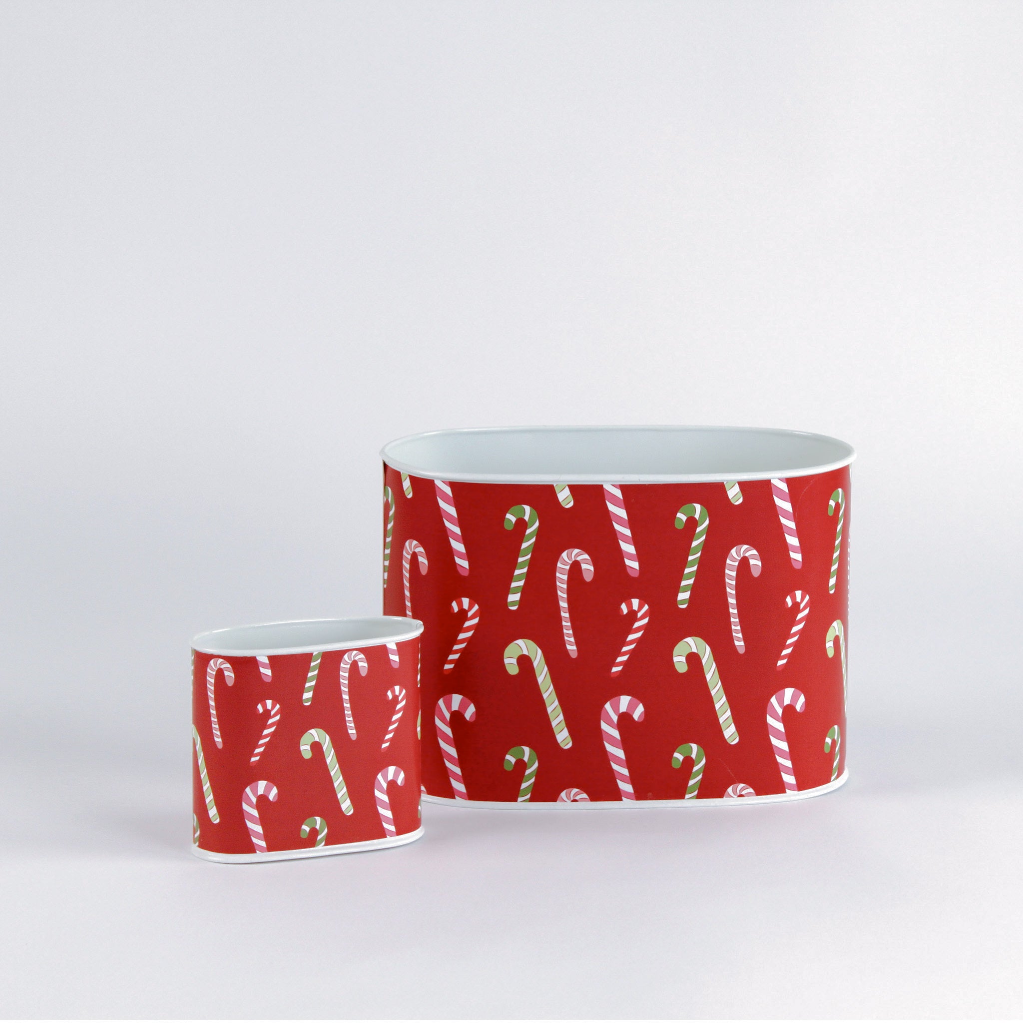 Two decoupage Dancing Candy Canes Christmas caddies with a candy cane pattern, one large and one small, placed on a white background.