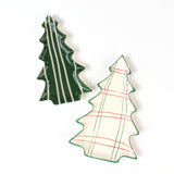 Two ceramic Christmas tree-shaped plates with plaid patterns on a white background