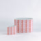 2 Madcap Cottage Caddies with pink and red geometric patterns on a white background