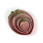 a set of four pink ceramic strawberry dishes in graduating sizes.