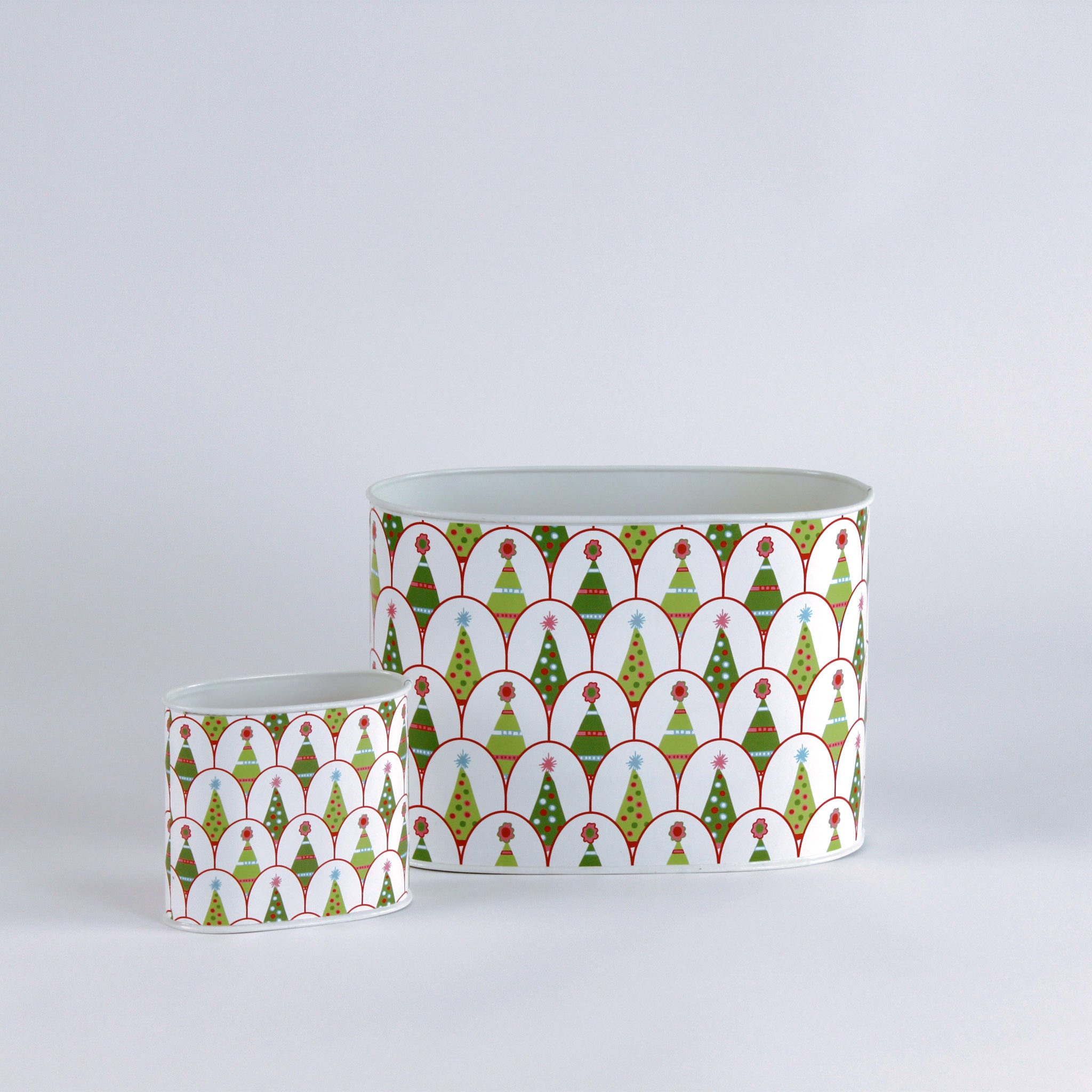 Two decorative containers with a festive pattern on a light gray background