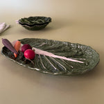a side view of a ceramic cabbage serving platter