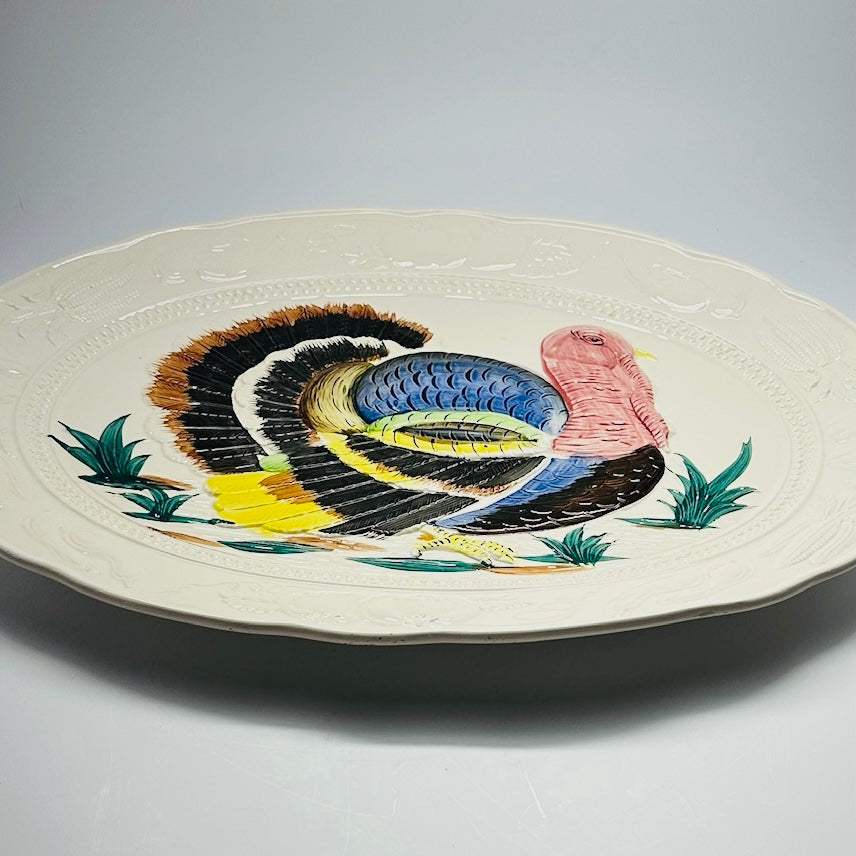 a vintage turkey platter from a side on view