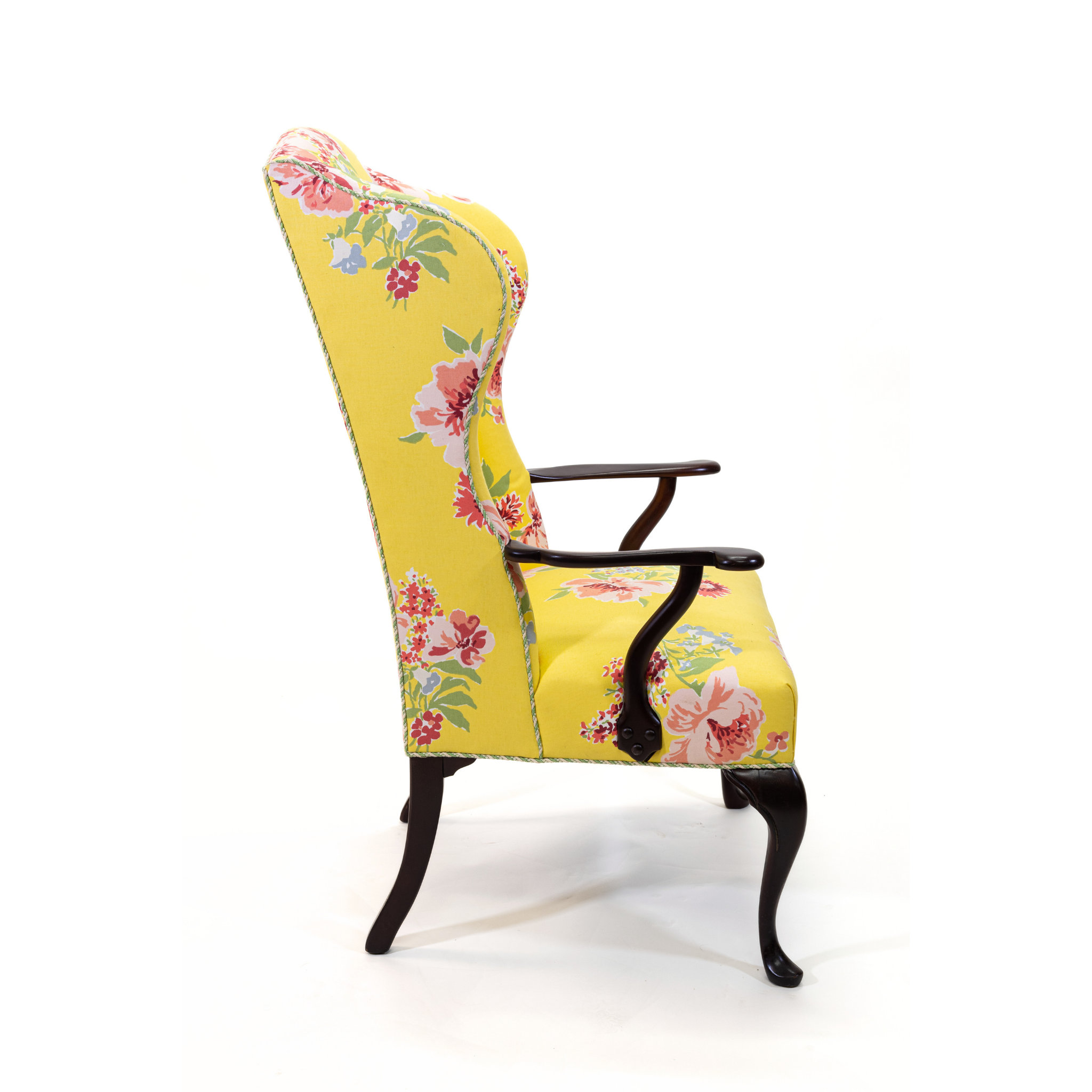 a yellow vintage floral armchair