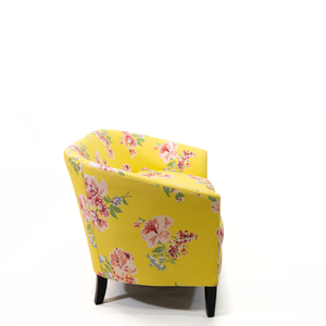 a yellow vintage floral loveseat