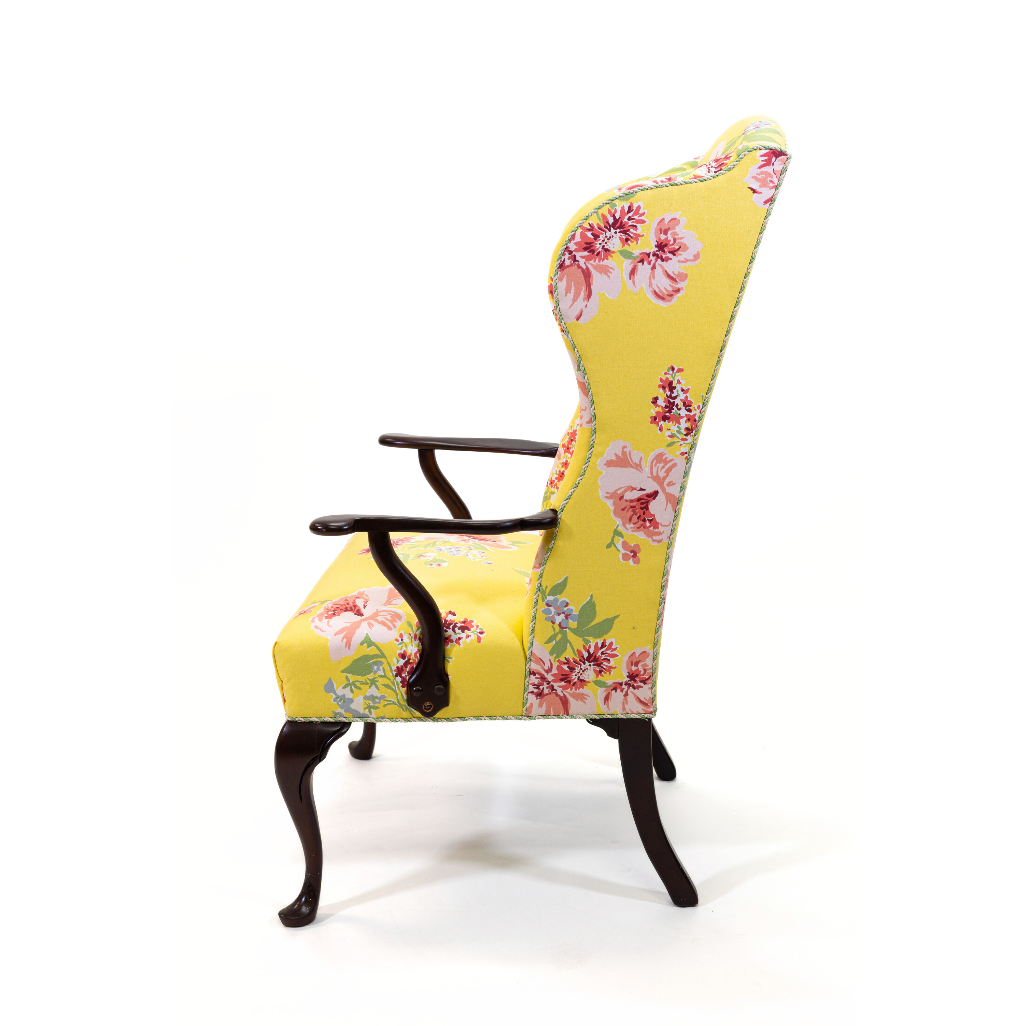 a yellow vintage floral armchair