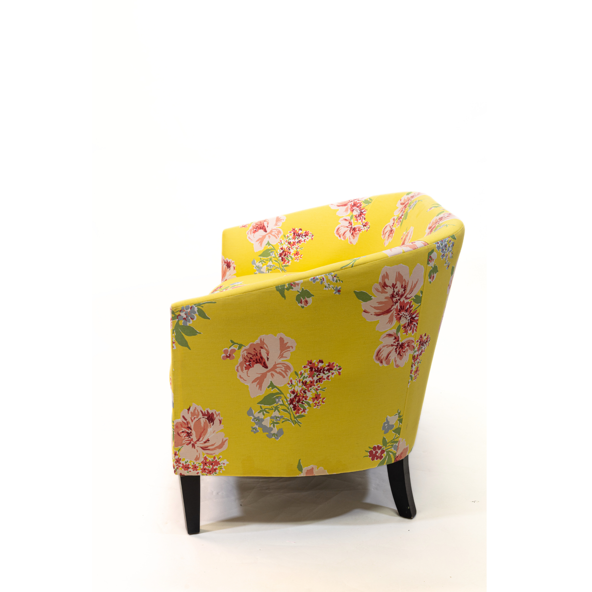 a yellow vintage floral loveseat