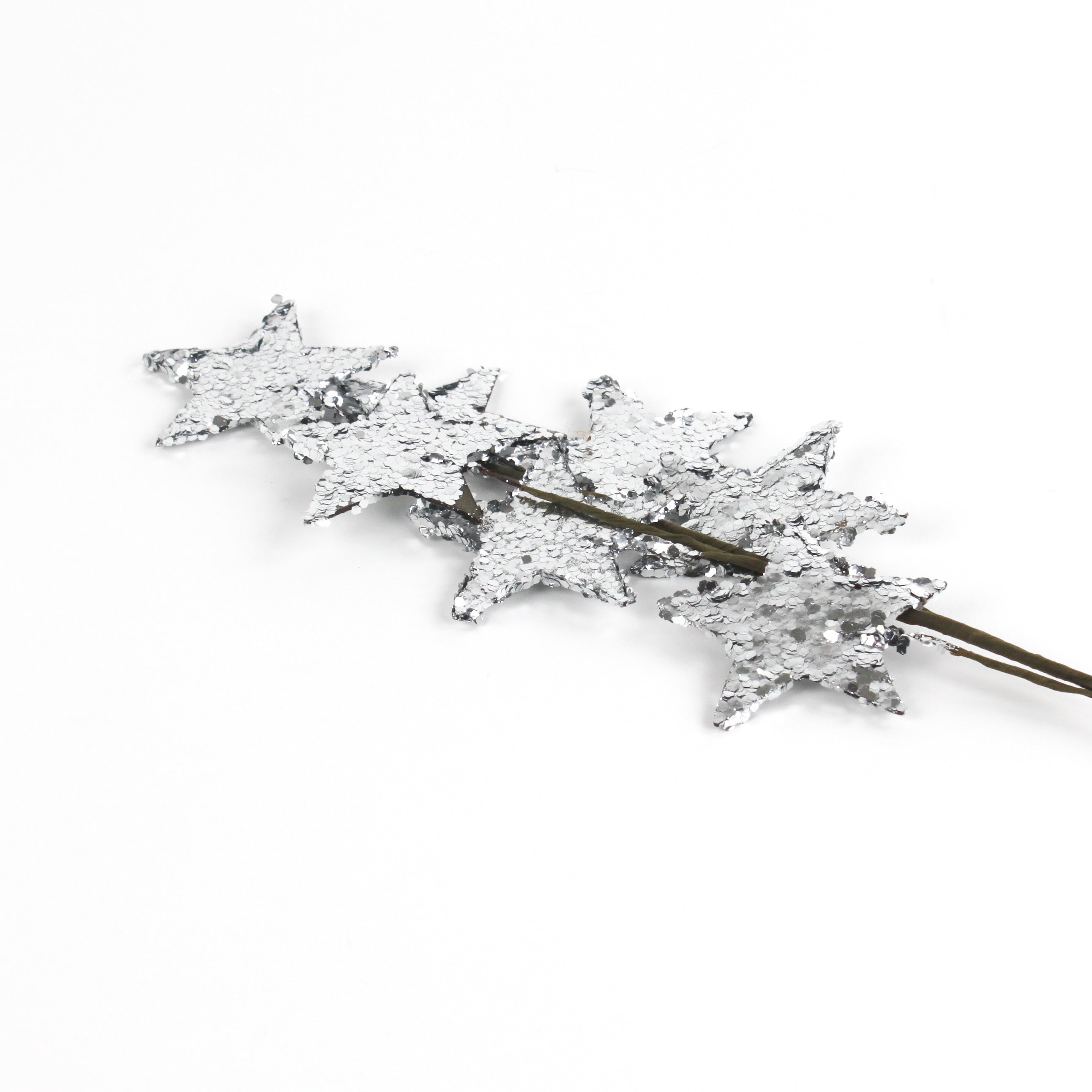 a silver spray of stars on a decorative branch. 