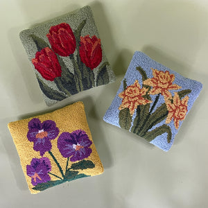 three spring flower pillows - pansies, tulips, daffodils