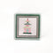 Square acrylic tray in small size with pagoda in middle using pink and green.