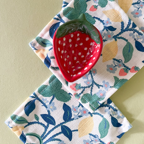 strawberry hill floral cloth cocktail napkins with strawberry accent dish